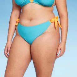 Women's Reversible Side-Tie High Leg Cheeky Bikini Bottom - Wild Fable™ 26 Women's Reversible Side-Tie High Leg Cheeky Bikini Bottom - Wild Fable™ -Wild Fable GUEST 77467828 c896 481d bb3b 24b2ec704c16