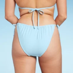 Women's Side-Tie Low-Rise High Leg Adjustable Bikini Bottom - Wild Fable™ Blue 10 Women's Side-Tie Low-Rise High Leg Adjustable Bikini Bottom - Wild Fable™ Blue -Wild Fable GUEST 924af3bc 7a86 4a95 8319 2249382b46e6