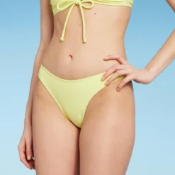 Women's High Leg Cheeky Bikini Bottom - Wild Fable™ Light Yellow -Wild Fable GUEST a2c99d9a 4aa1 45df abd7 63ac01000aa1